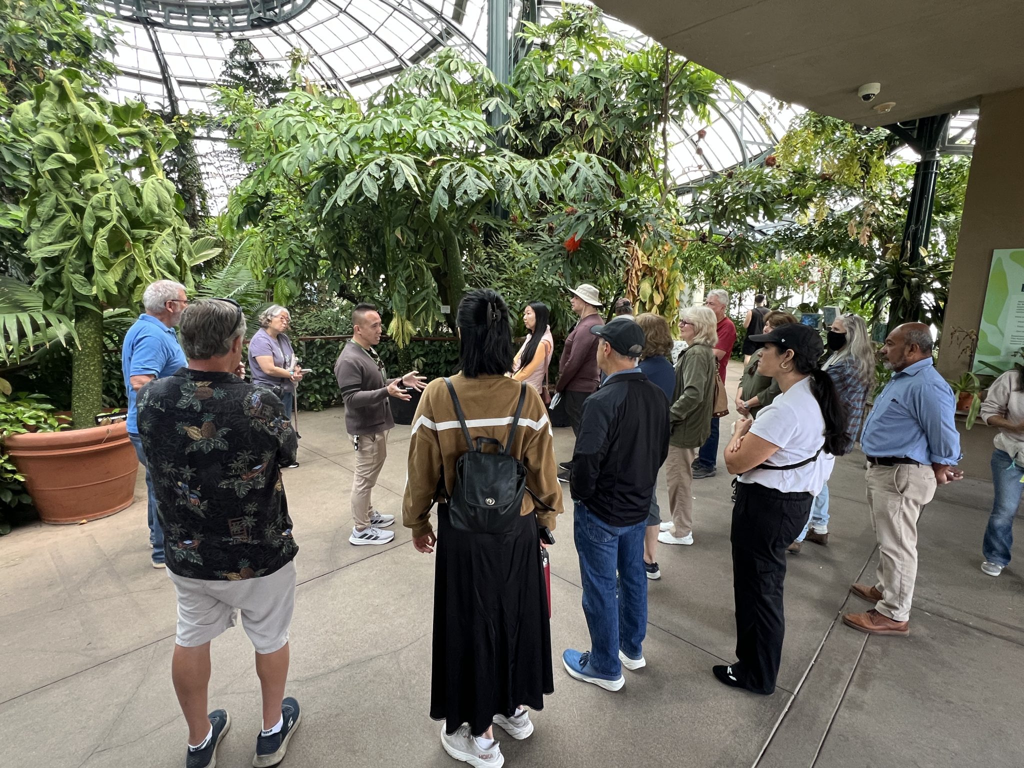 Members exploring the Huntington conservatory